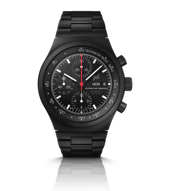 Sleek black Porsche Design chronograph watch with three subdials, red second hand, tachymeter markings, and day-date display on a black metal bracelet—an ideal pick for any 2025 Holiday Gift Guide, shown on a white background.