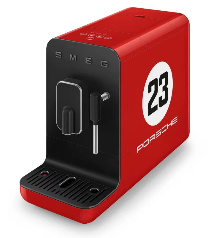 A red SMEG espresso machine with a black front panel, labeled with the number 23 and