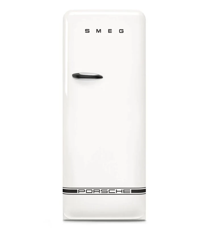 A white SMEG refrigerator with a black handle and a